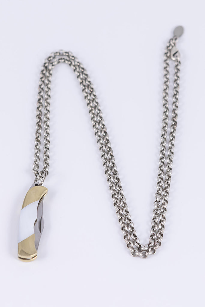 http://www.wearesoundasever.com/cdn/shop/products/Folding-knife-necklace.jpg?v=1635978208